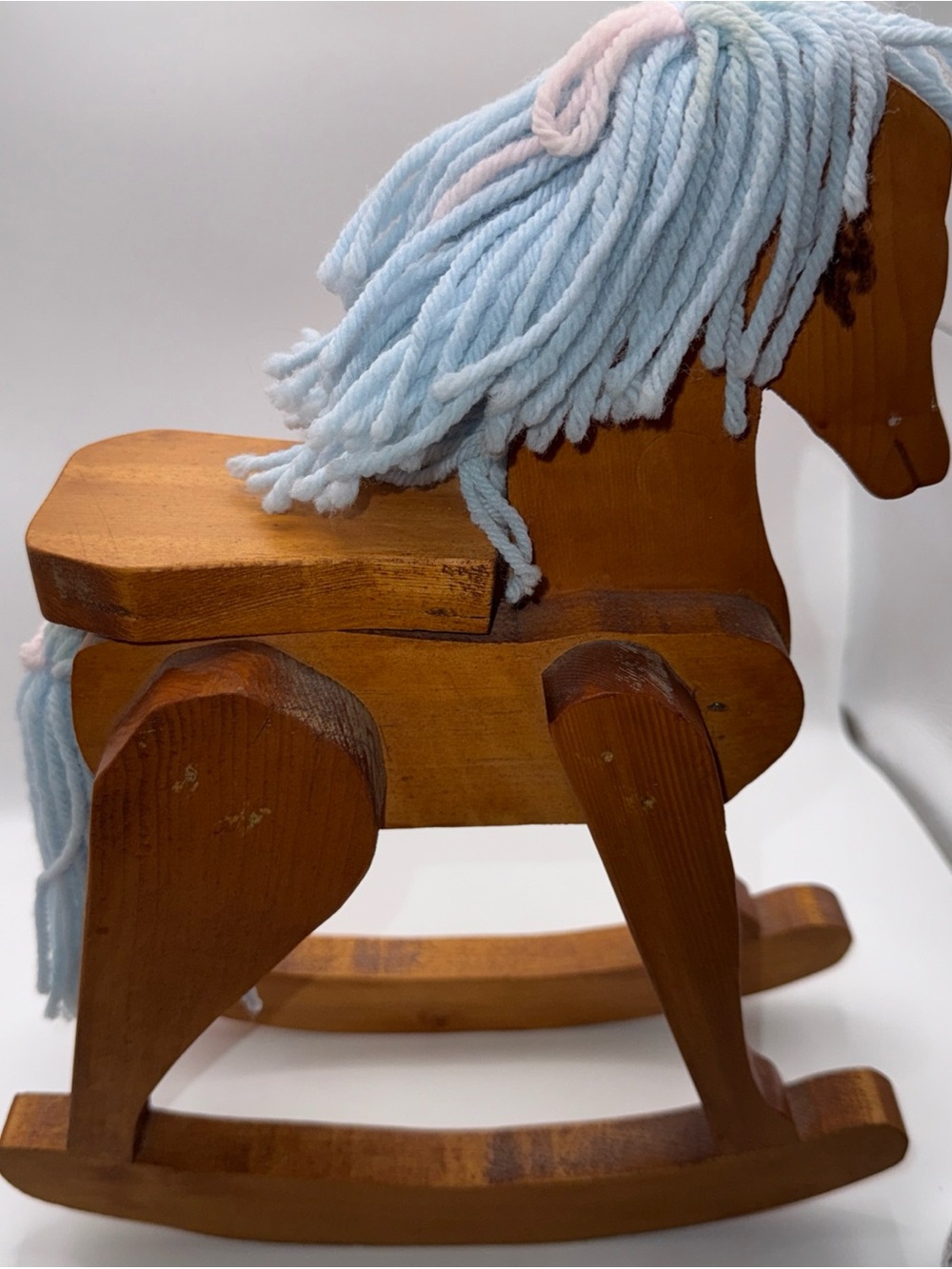 Wooden Rocking Horse with Light Blue Yarn Mane